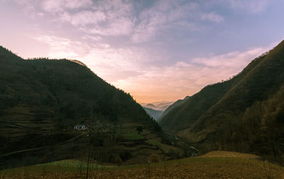 Scenic view of mountains against sky during sunset