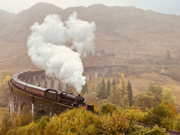 Steam train on a viaduct