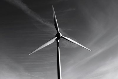 Low angle view of wind turbine against sky