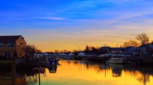 Scenic view of calm lake at sunset