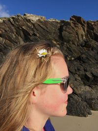 Young girl with a flower in her hair