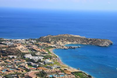 High angle view of sea against blue sky