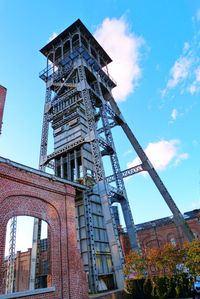 Low angle view of built structure against blue sky