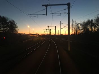 View of railway tracks at sunset