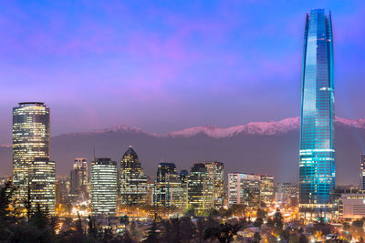 Financial district skyline with los andes mountains in the back, las condes, santiago de chile