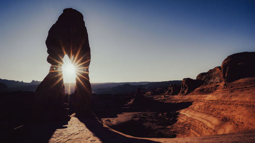 Scenic view of landscape against sky during sunset