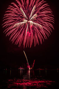 Firework display at night