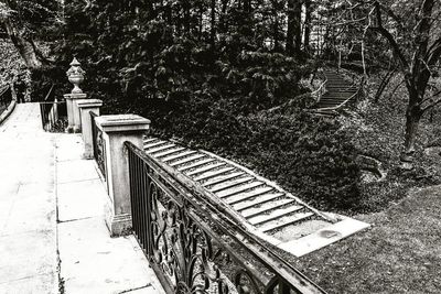 High angle view of woman standing on footpath