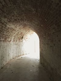 Tunnel seen through archway