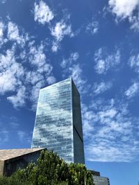 Low angle view of modern building against sky