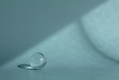 Close-up of water drop on table