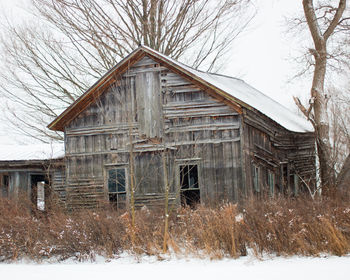 Abandoned house during winter