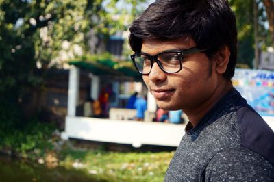 Portrait of young man in park