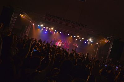 People enjoying music concert