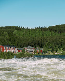 Scenic view of river against clear sky