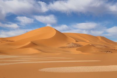 Scenic view of desert against sky