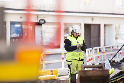 Worker in reflective clothing during work