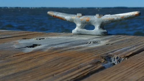 Close-up of wood on beach