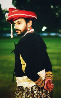 Side view of young man looking away