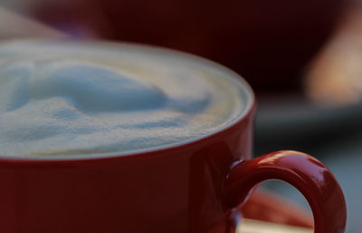 Close-up of coffee cup on table