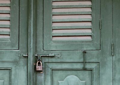 Full frame shot of locked door of house