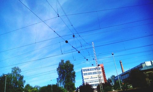 Low angle view of building against blue sky