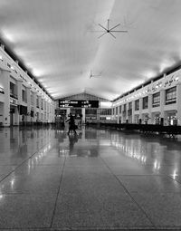 People walking in airport building