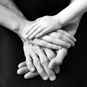 Close-up of hands holding baby feet