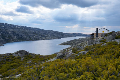 Beautiful house social distancing in lake lagoa comprida lagoon in serra da estrela, portugal