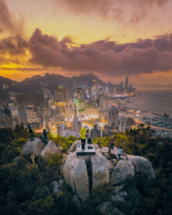 High angle view of city buildings during sunset