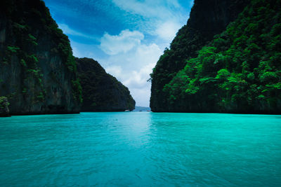 Scenic view of sea against blue sky