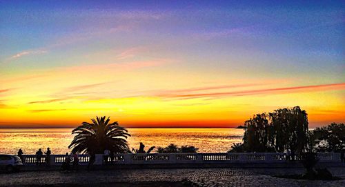 Scenic view of sea against sky at sunset