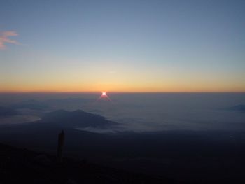 Scenic view of sunset over landscape