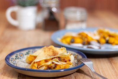 Close-up of breakfast served on table