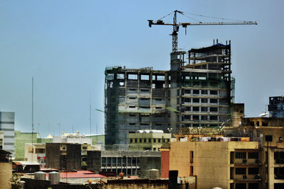 Low angle view of buildings against clear sky