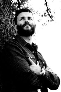 Portrait of man in tree