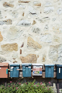 Mailboxes mounted on wall