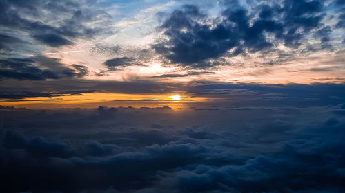 Low angle view of dramatic sky during sunset