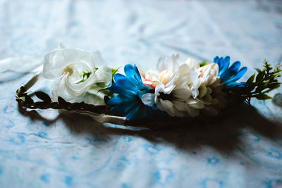 High angle view of multi colored roses on table