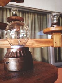 Close-up of glass jar on table