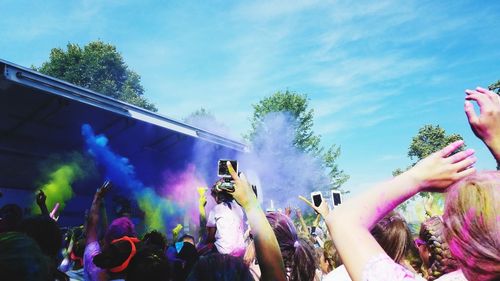 People enjoying at festival and music concert