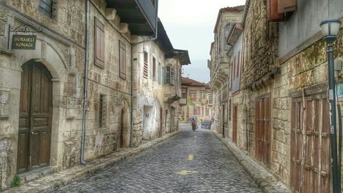 Narrow alley along buildings