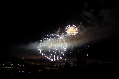 Firework display at night