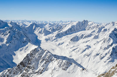 Scenic view of snow covered mountains