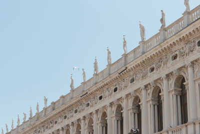 Low angle view of historical building against clear sky