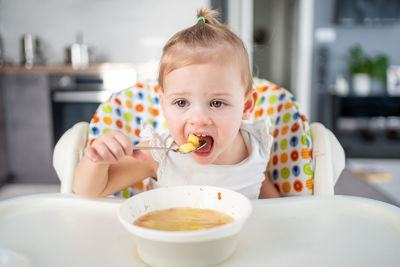 Close-up of boy eating food