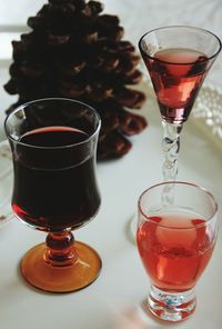 High angle view of drinks in glasses on table