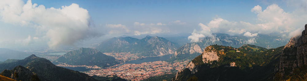 Panoramic view of mountains against cloudy sky