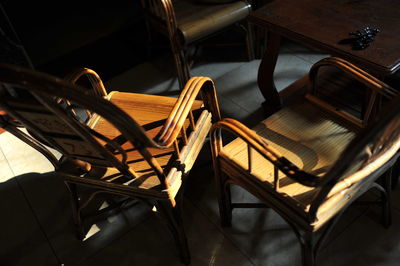 High angle view of empty chairs and table in restaurant