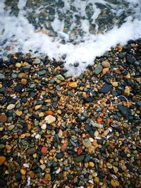 High angle view of stones on beach